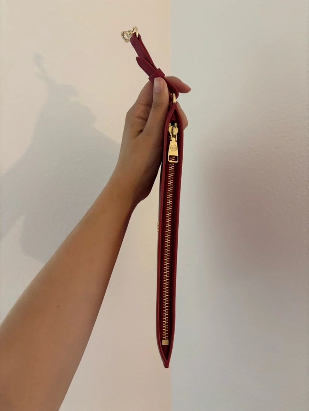 Tory Burch zip pouch in red and gold